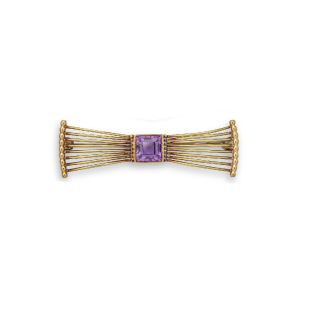 A Vintage amethyst stylised bow brooch  brooch, 14ct YG.